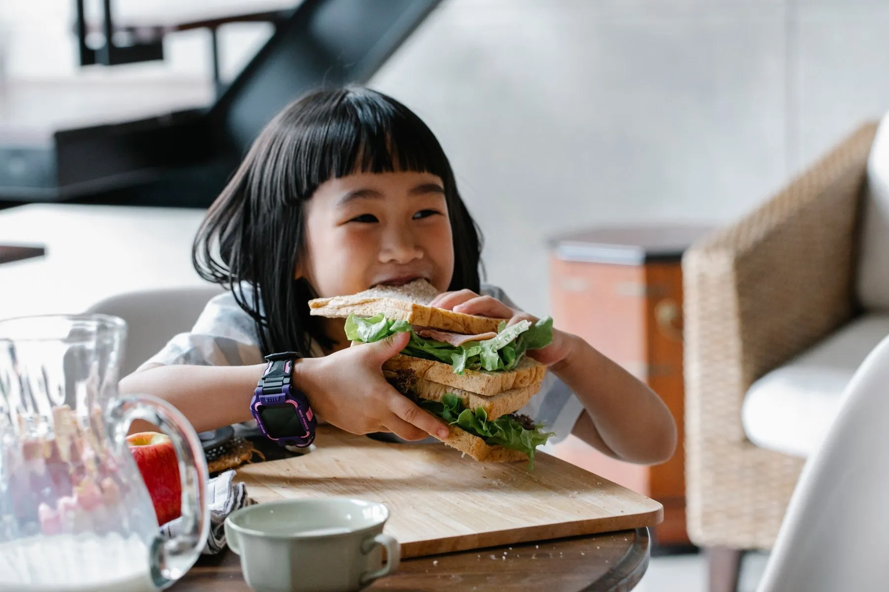 A child eating lunch at a table
